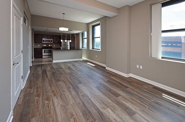 Model - Living Area with All New LVT Hard Surface Flooring - The Residences At Hanna