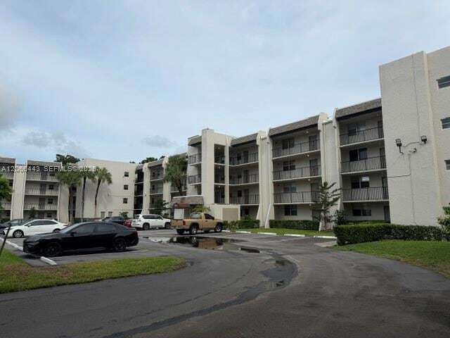 Building Photo - 9420 Poinciana Pl Unit 407