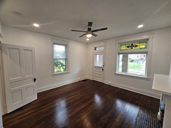 Front room. - 3914 S Madison Ave Unit Floor 1