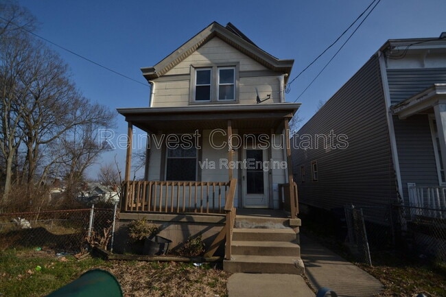 Building Photo - 1658 Iliff Ave