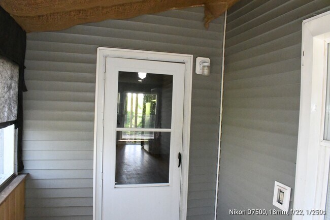 Front door entrance to unit from storm room. - 77 Fox St
