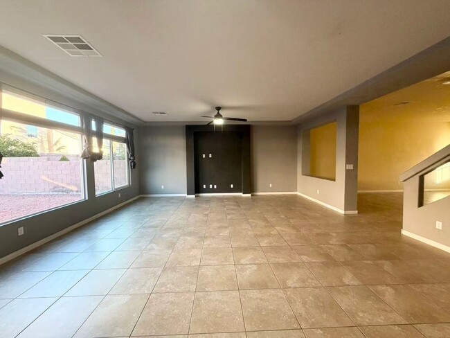 Photo - Spacious 5-Bed, 2.5-Bath Las Vegas Home with Granite Kitchen & Garage