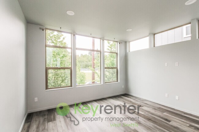 Photo - Modern 3 Bedroom with Rooftop Deck and In Unit Laundry