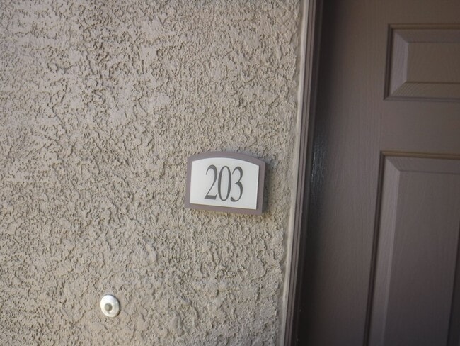 Building Photo - SECOND STORY CONDO IN GATED COMMUNITY WITH...