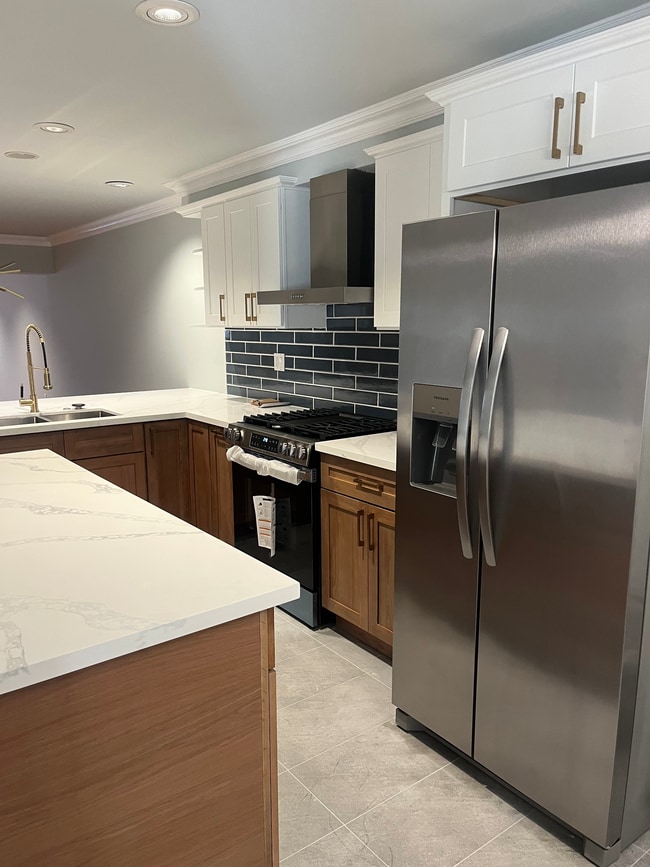 White Oak kitchen with quartz countertops - 6221 Monterey Rd Unit East