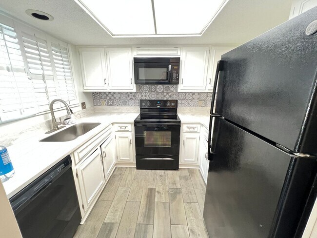 Photo - Stunning and Spacious 2 Bedroom, 2.5 Bath, Town Home With Sunroom and Deck!