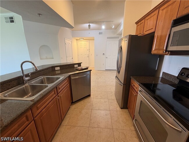 Building Photo - 12970 Positano Cir Unit 306