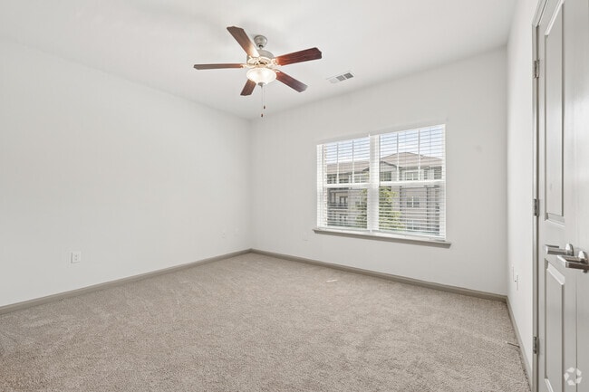 3BR, 2BA - 1,202SF - Primary Bedroom - Arbours at Covington