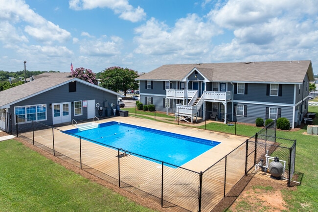 Enjoy our beautiful grounds featuring a community pool and well-maintained common areas, professionally operated by Highlands Vista Group.