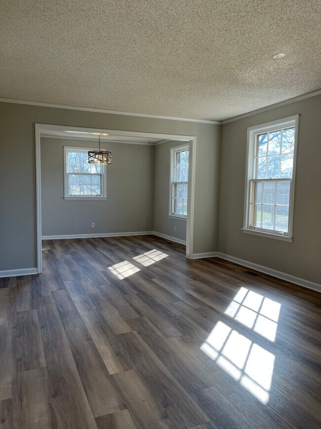 Photo - Charming 3BR/2BA Home: New Flooring, Spaci...