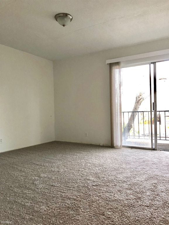 Bedroom upstairs with Balcony.