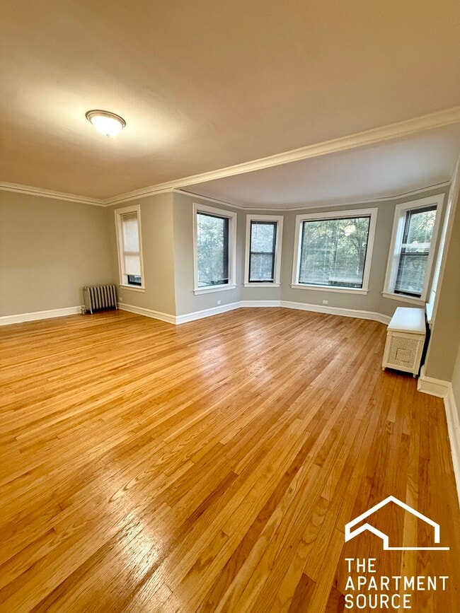 Building Photo - 6901 S Paxton Ave Unit 3