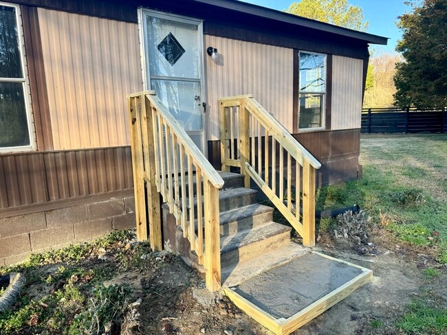 Back door entrance with new handrails - 1057 Shiloh Rd N