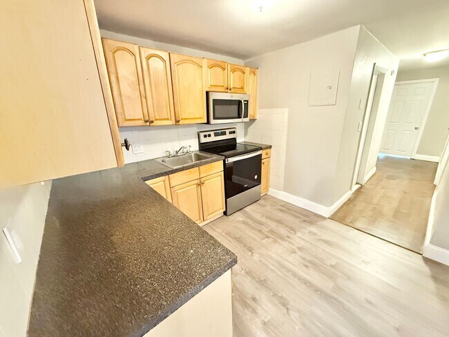 Photo - Newly Renovated 2 Bedroom with Off-Street ...