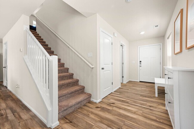 Photo - Spacious 3-Bedroom Home with Bonus Room, Main-Floor Den & Covered Patio Near JBLM