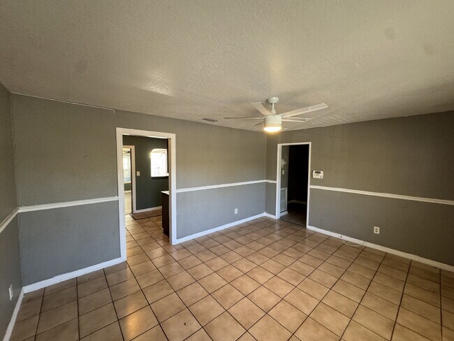 Photo - "Spacious 5-Bedroom Haven with 2 Full Baths in Tampa's Heart – 1656 Sq Ft of Comfort!"