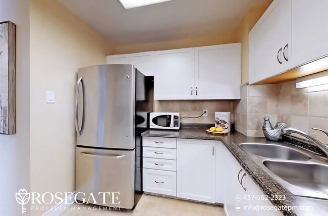 Photo - Spacious 3-Bedroom Condo with Parking & Stainless Steel Appliances – Kitchener Unit 317