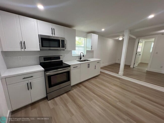 Building Photo - 10540 NW 28th Ave Unit 2-2 Rental