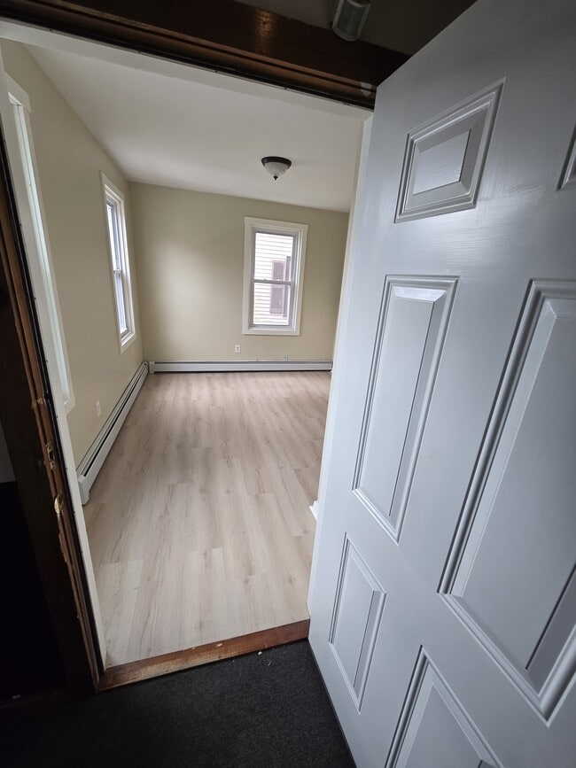 Entering the livingroom - 239 State St Apartments Unit First floor