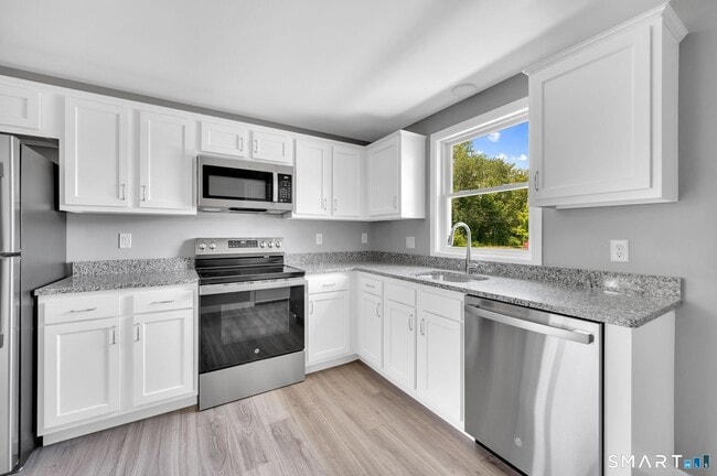 Building Photo - 90 Woodhouse Ave Unit 4