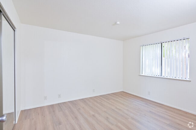 2BR, 1BA - 1000SF Laminate First Bedroom - Garden Terrace Apts