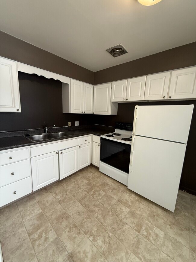 Kitchen - MadGrey Apartments