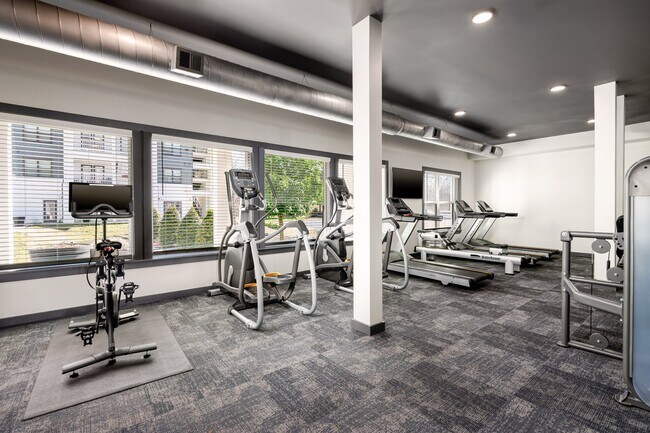 24-Hour Cardio and Strength Training Fitness Center featuring Peloton Bike, Hub Training System, Water Rower, Free Weights and More!