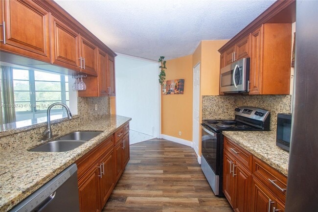 Photo - 3100 N Pine Island Rd Unit 207