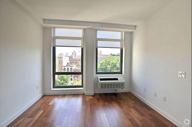 Building Photo - 321 E 3rd St Unit 3D Rental