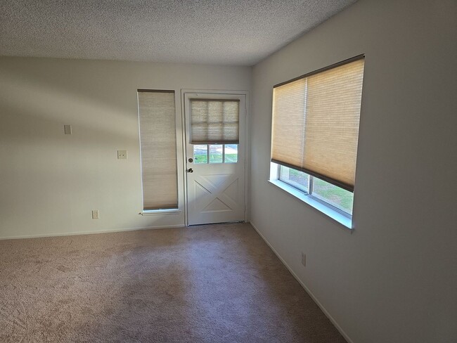 Building Photo - Popular two story condo with garage