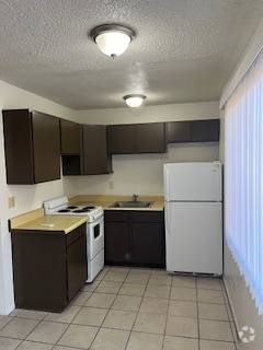 Building Photo - 3052 N Alvernon Way Unit 101 Rental