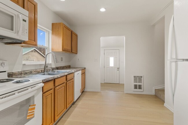 Photo - Charming 3-Bedroom, 1-Bathroom Home with Upstairs Bonus Area