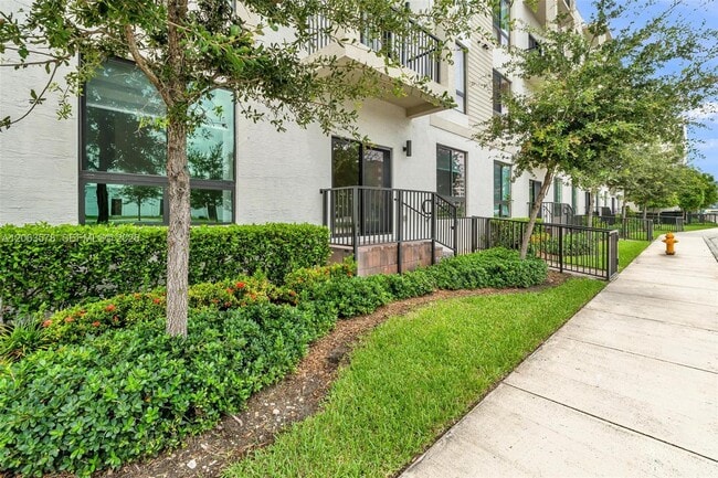 Building Photo - 8167 NW 41st St Unit E-110