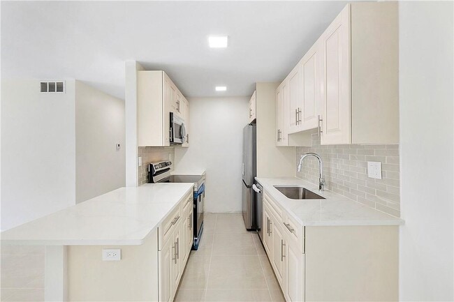 Building Photo - 11605 NW 29th Ct Unit 2d