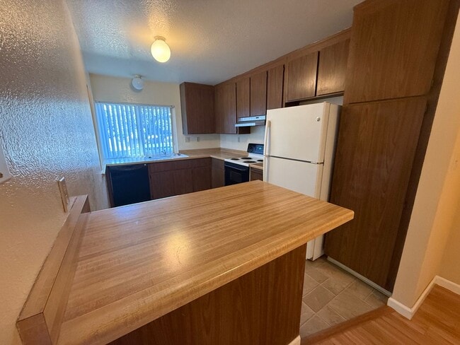 Photo - Spacious 2bd First Floor Condo W/Private Patio, Attached Garage, & Private Laundry Room