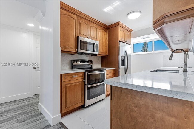 Photo - 8340 Harding Ave Unit 201