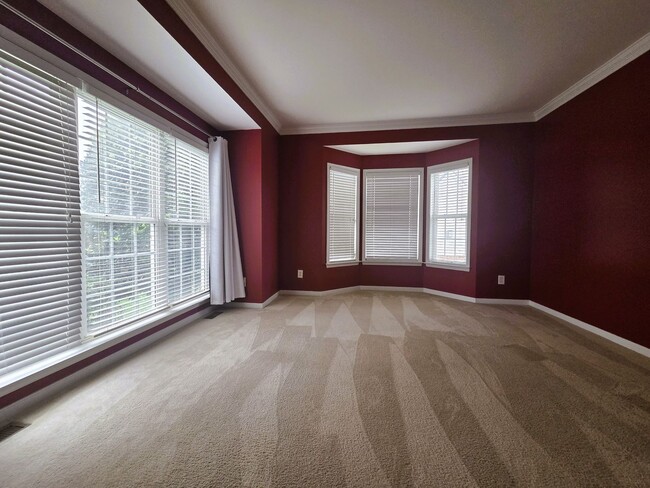 Photo - Stately brick front contemporary on huge c...