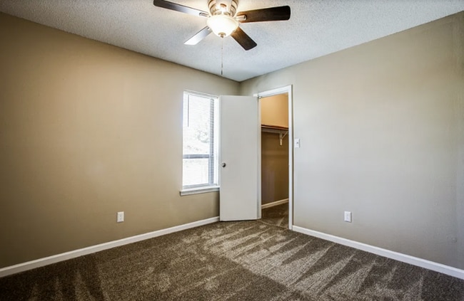 bedroom view of closet