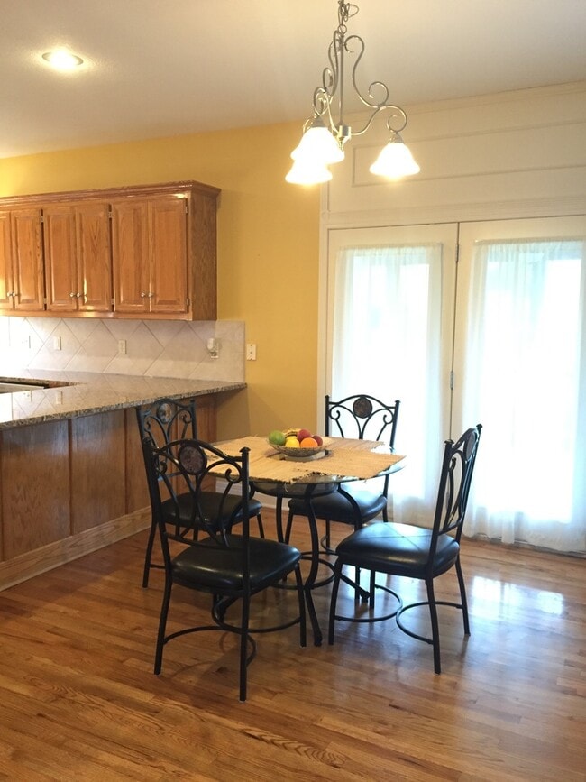 Photo - {7301} Quiet Cul-de-sac + Three Car Garage + Updated Kitchen + Finished Basement + Bedroom Level ...