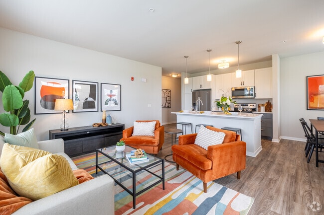 2BR, 2BA - 1,104SF - Living Room - Seasons at North Aurora