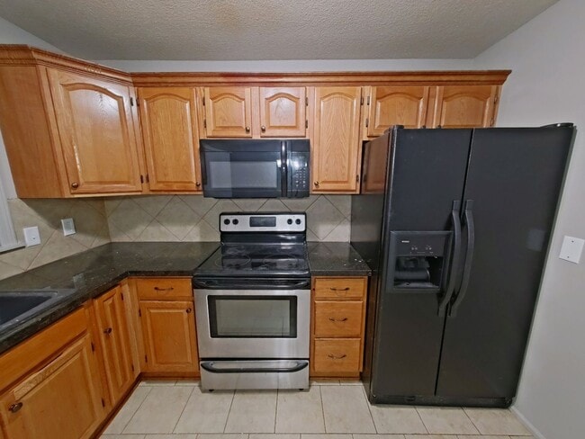 Photo - Lovely 3 bedroom/1.5 bath home with one car garage and finished basement.