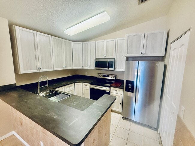 Photo - For Rent: Spacious 3-Bedroom, 2-Bath Second-Floor Condo with Balcony & Community Amenities Unit 327