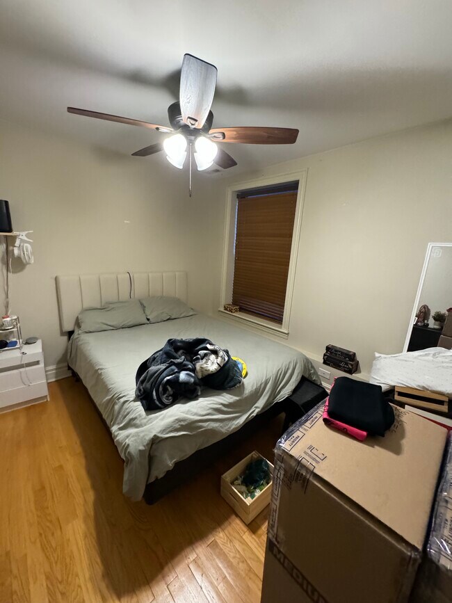 Bedroom 1 is master bedroom with en suite bath - 3925 W Altgeld St Unit 1