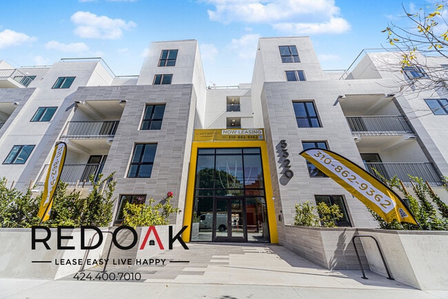 Building Photo - 5320 Cartwright Ave Unit 312