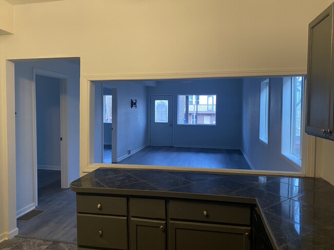 Living / Dining Room view from Kitchen - 2469 S 12th St Apartment Unit Lower