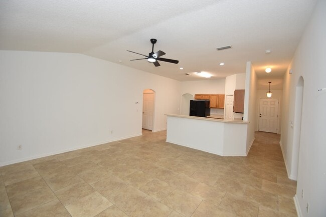 Photo - Fenced yard at this spacious 4-Bedroom Oasis with 2 Baths in Charming Palm Coast Retreat!