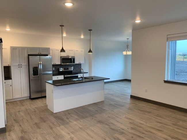 Photo - 3 Bed/2.5 Bath Townhome! Beautiful Finishes With 2 Patios That Over-Look a Park Setting!