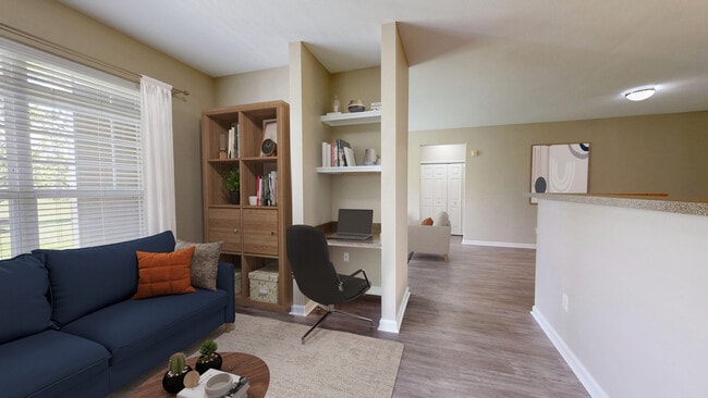 Sala de estar con estudio - Columns on Wetherington Apartments