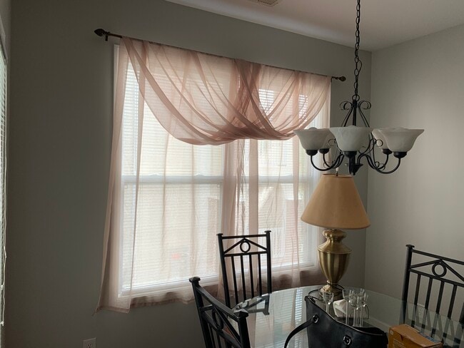 Dining room. - 712 Indica Ct Unit Azalea Trace # 202