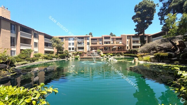 Building Photo - Charming Updated Condo Available Now in De...